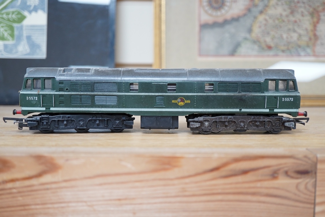 A quantity of 00 gauge railway by various makes, comprising; nine locomotives by Tri-ang, Hornby Dublo, etc. (one missing tender), sixteen maroon bogie coaches and eighteen freight wagons